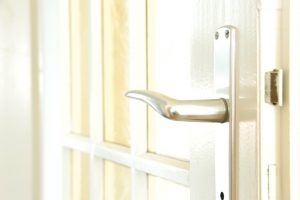Smooth door handle and high security lock with locksmith Manchester